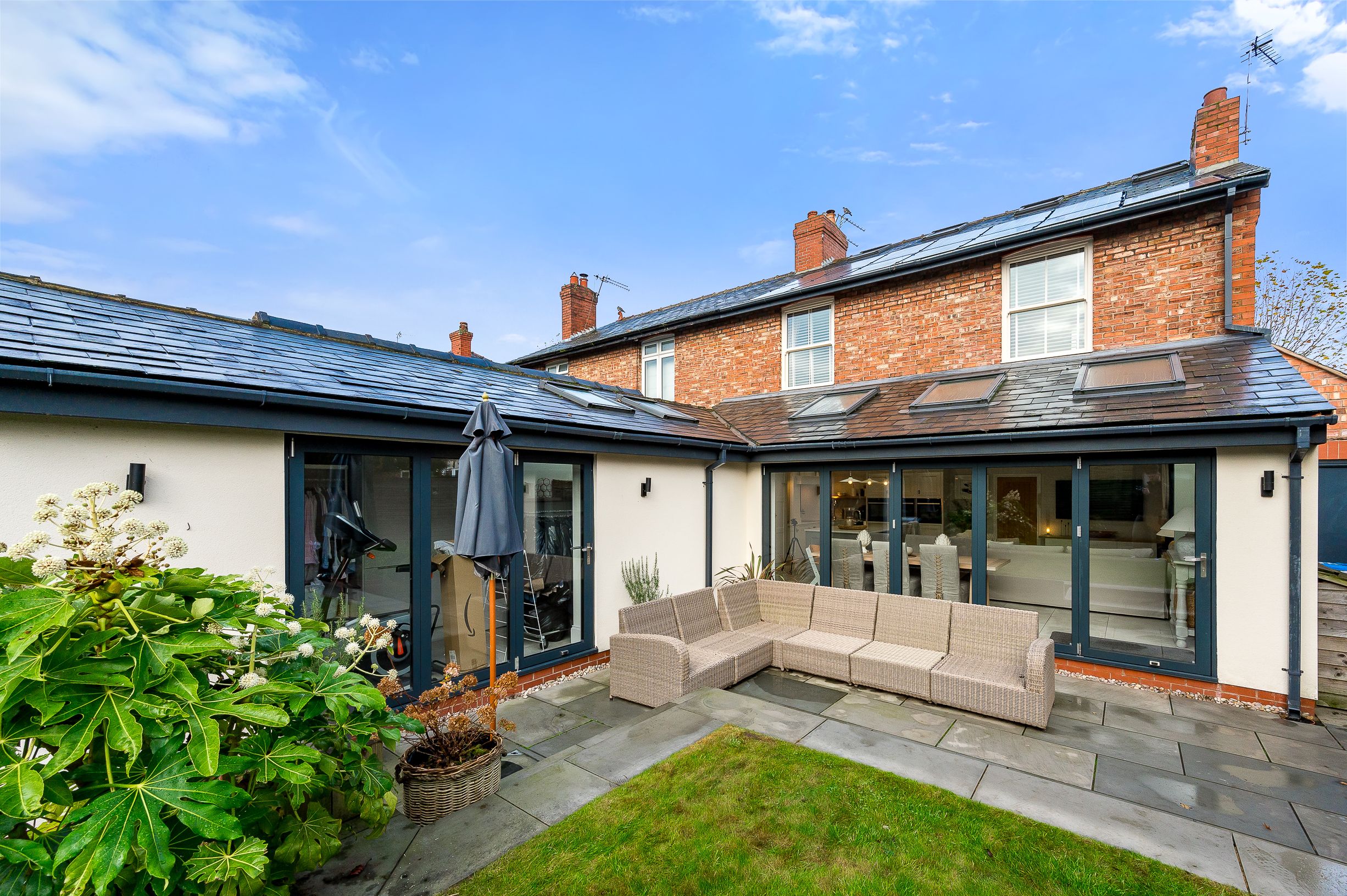 The back garden of a retrofitted home that now helps save money and produces low energy